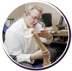 https://www.nespinalcare.com/wp-content/uploads/2023/09/Chiropractor-Norwood-MA-Andrew-Smyth-Consultation-v5.webp